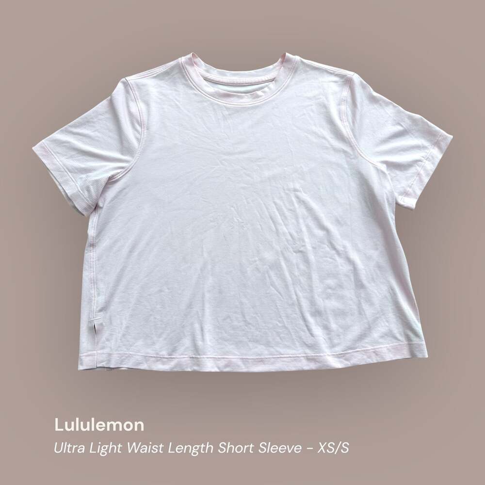 Lululemon Ultra Light Waist Length Short Sleeve Shirt Pink XS/S see measurements